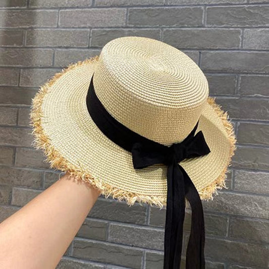 Stylish Straw Hat with Black Ribbon Bow