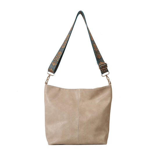 Vintage Brown Leather Hobo Bag with Patterned Webbing Strap